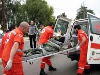 زوجة قرة علي أثناء نقلها الى المستشفى