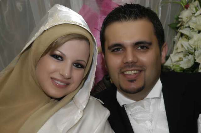 الوالدان الشابان علي ومنى حمّود