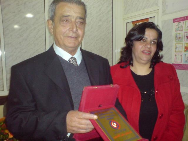 أم سلام وأبو سلام  حليم القسيس يوم تكريمه في مؤسسة عامل