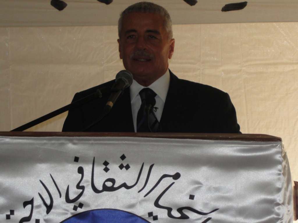 الدكتور كرم كرم إثناء إلقاء كلمته