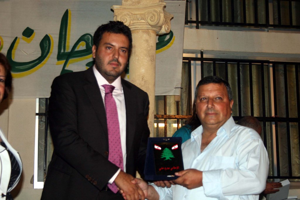 الاعلامي جورج عشي مكرما