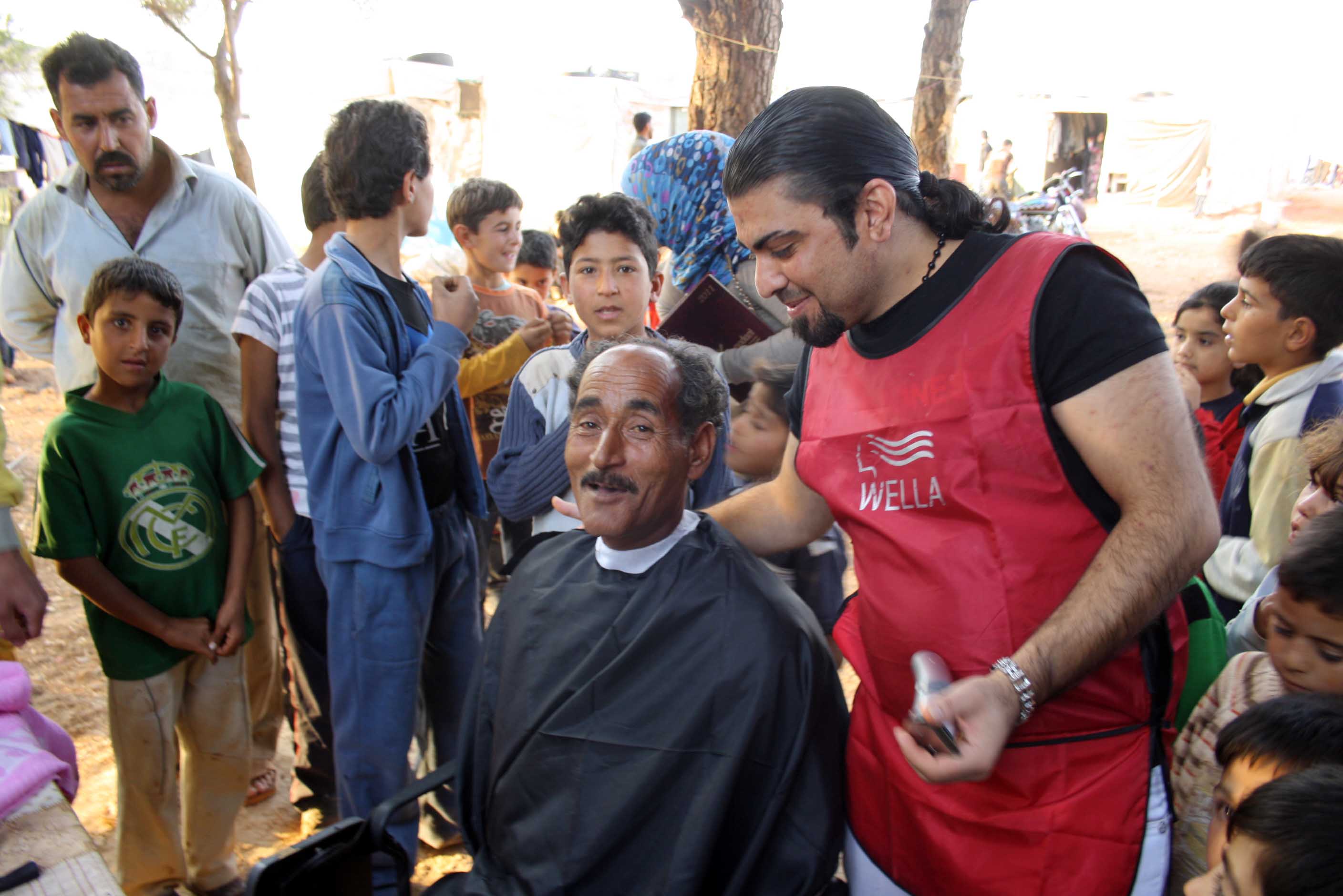 حملة  حلاقة شعر للاطفال السوريين في مرج الخوخ – مرجعيون