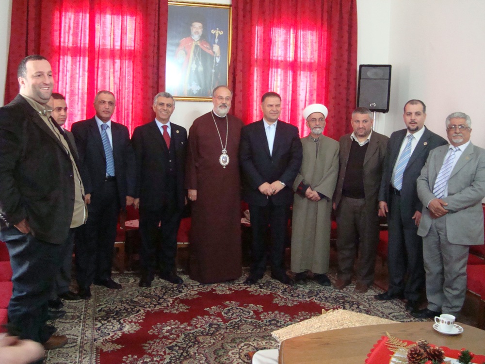 المطران حداد مستقبلا النائبان فياض وهاشم والدكتور حمدان والشيخ ناصر وفاعليات للتهنئة بالعيد