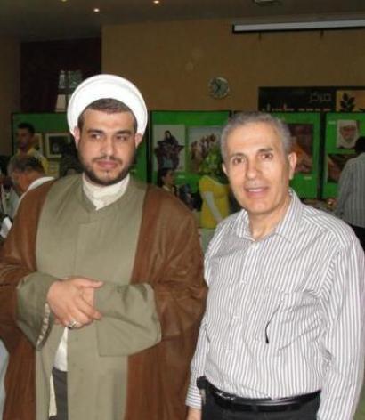 الشيخ محمد قانصو والأستاذ عزت رشيدي خلال أحد الأنشطة الثقافية - أرشيف