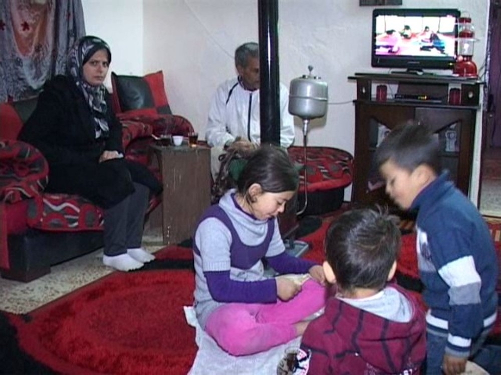 العائلة مع اطفالهم