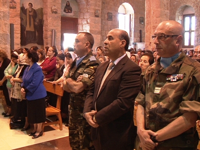 رئيس البلدية ضاهر والمقدم كابيلا وضابط فرنسي يشاركون في قداس عيد مار جرجس