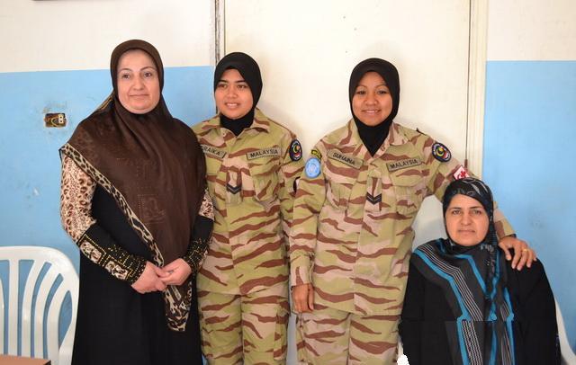 أفراد من الكتيبة الماليزية.. قريبون جداً من الحياة الدينية والإنسانية