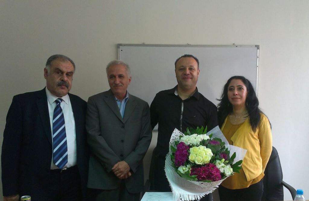 الأستاذ عيّاد مهنا والدكتور شوكت اشتي يتوسطان الدكتورة هيفاء سلام والدكتور عبد الحكيم غزّاوي