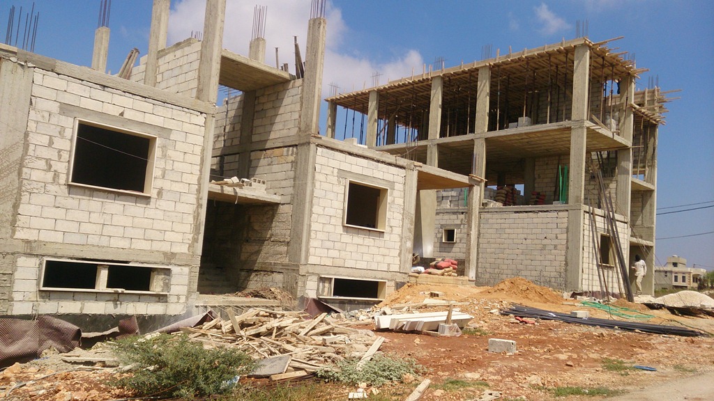 أعمال صب السقف الأخير لبلوك ب