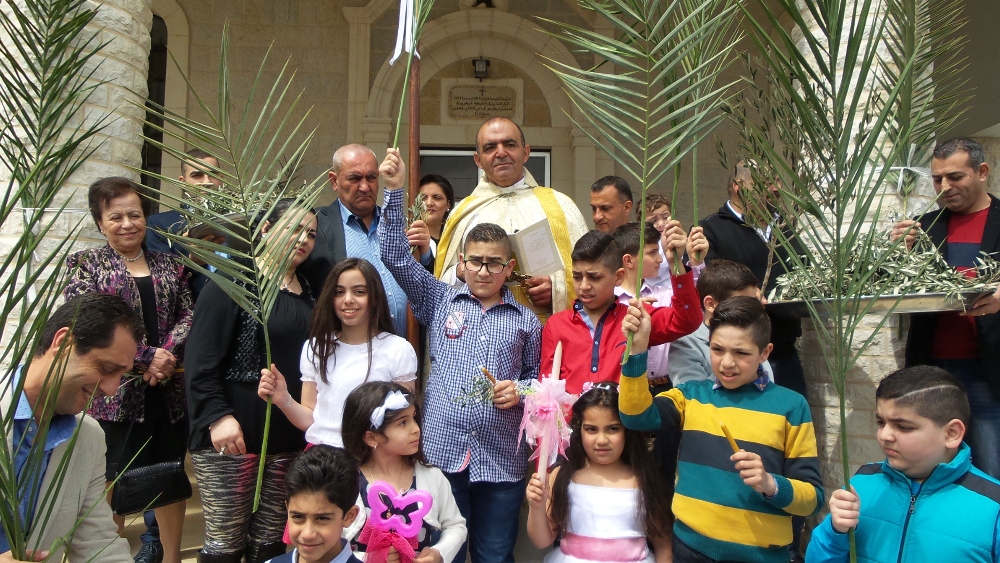 -الاب حنا الخوري احتفل بقدا احد الشعانين في كنيسة السيدة