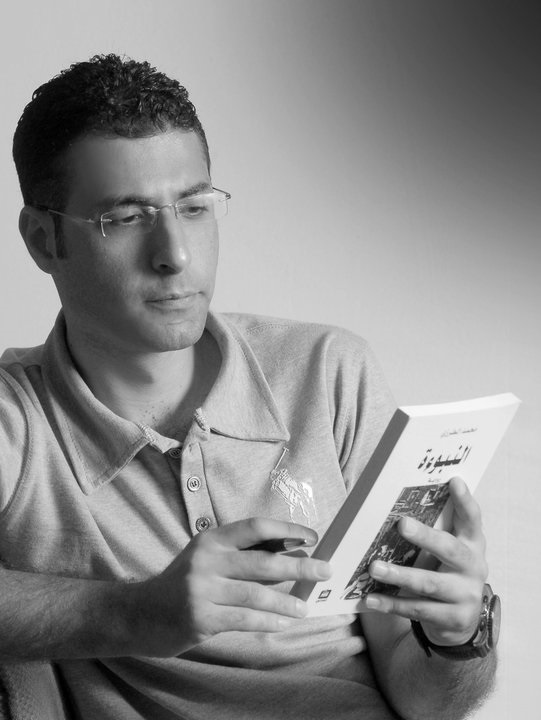 الكاتب محمد طرزي